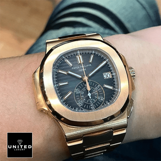 Patek Philippe Nautilus 5980 Brown Dial Premium Duplicate patek philippe hand Patek Philippe Black Dial Rose Gold Bezel Replica in the man wrist