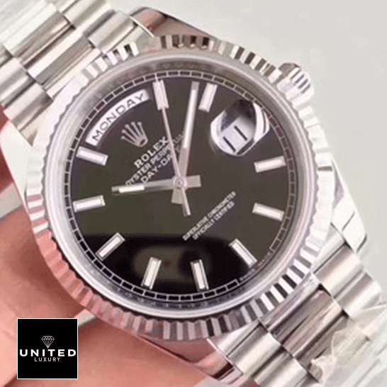 Rolex Day-Date 228239 Super Clone Edition rolex day date 228239 ew stainless steel silver black dial left Rolex Day-Date 228239 Black Dial Replica on the hand