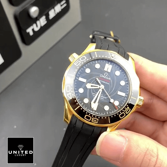 Omega Seamaster Diver 300m Gold Case Black Bezel Replica on the hand