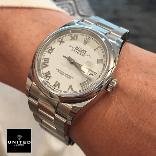 Rolex Datejust 126200-0008 White Dial Swiss Super Clone rolex datejust 126200 0008 replica man The Rolex Datejust 126200-0008 on his arm